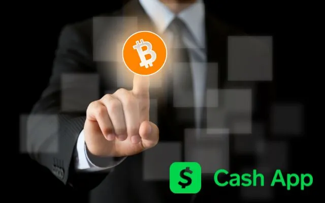 A Person pointing at a Bitcoin Logo symbolizing bitcoin on Cash App